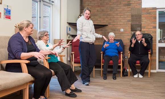 Instructor Hayley Powell leads an exercise course at Spire Home's Crispian Court