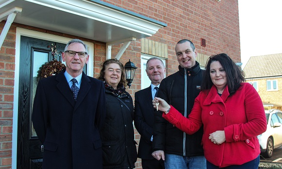 Matthew and Melanie Ronan’s get the keys to their new three-bedroom house