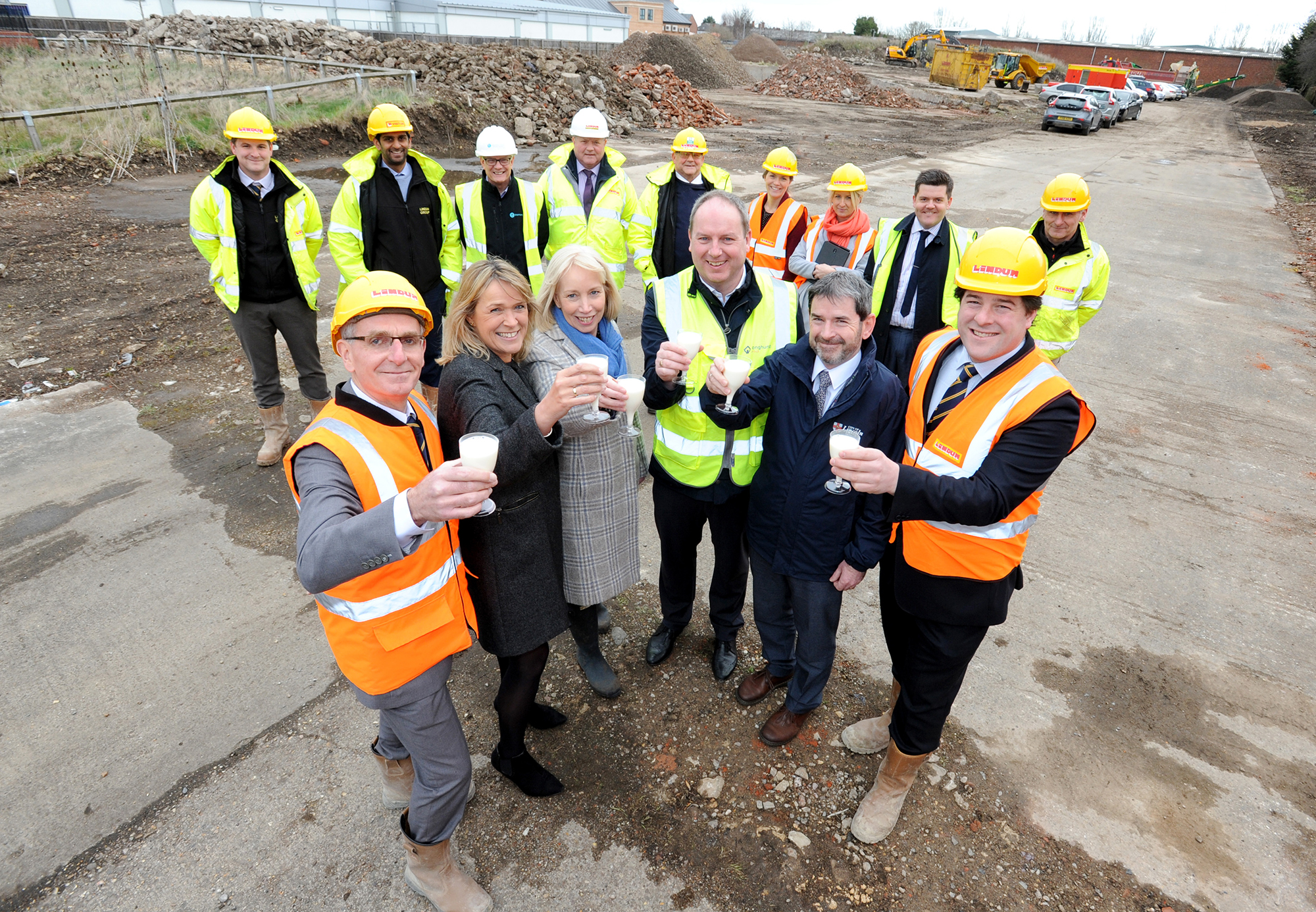 Representatives from Longhurst Group and Lindum Homes toast the start of work on the former Boultham Diary site in Lincoln