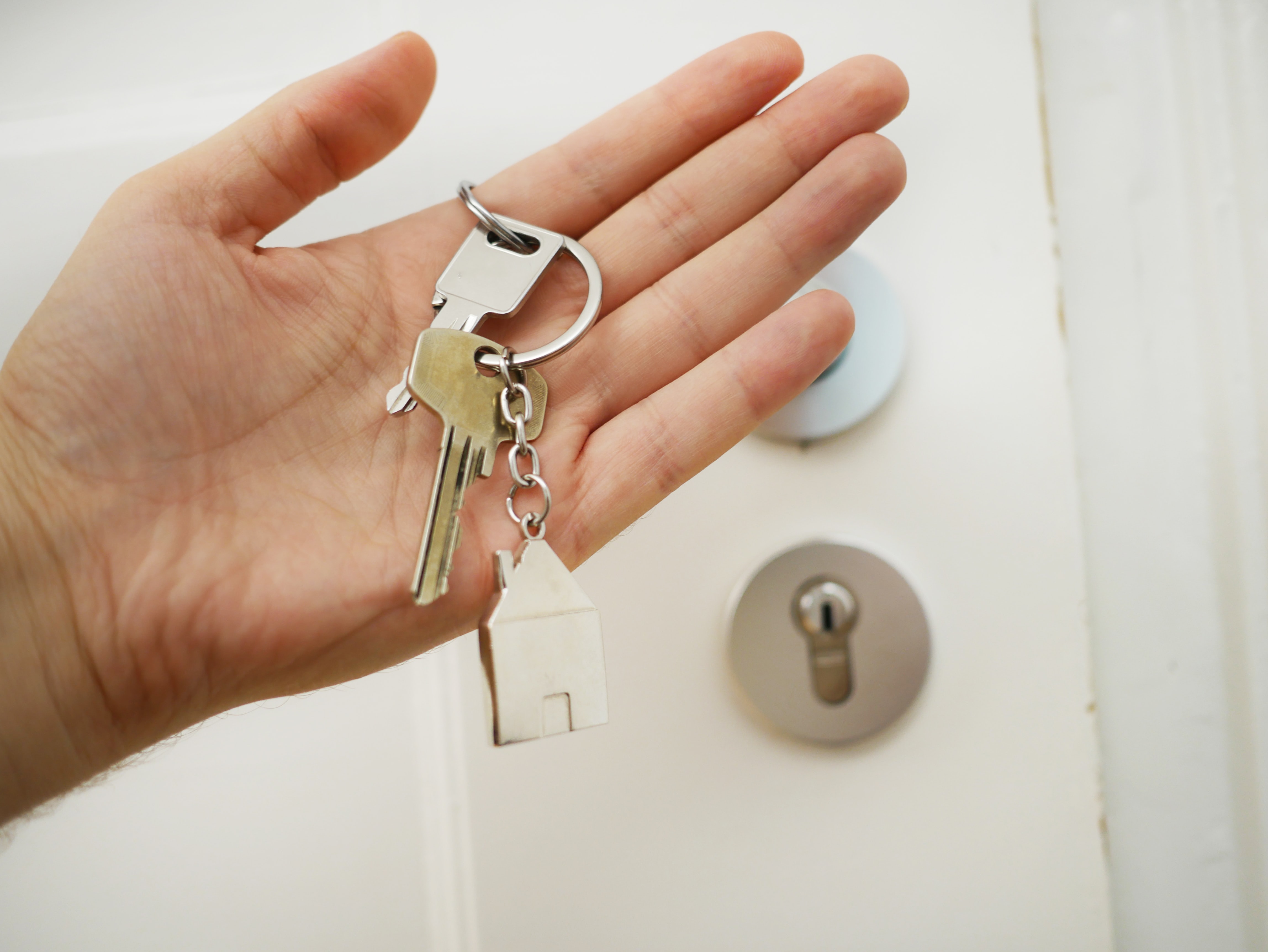 A hand holding keys