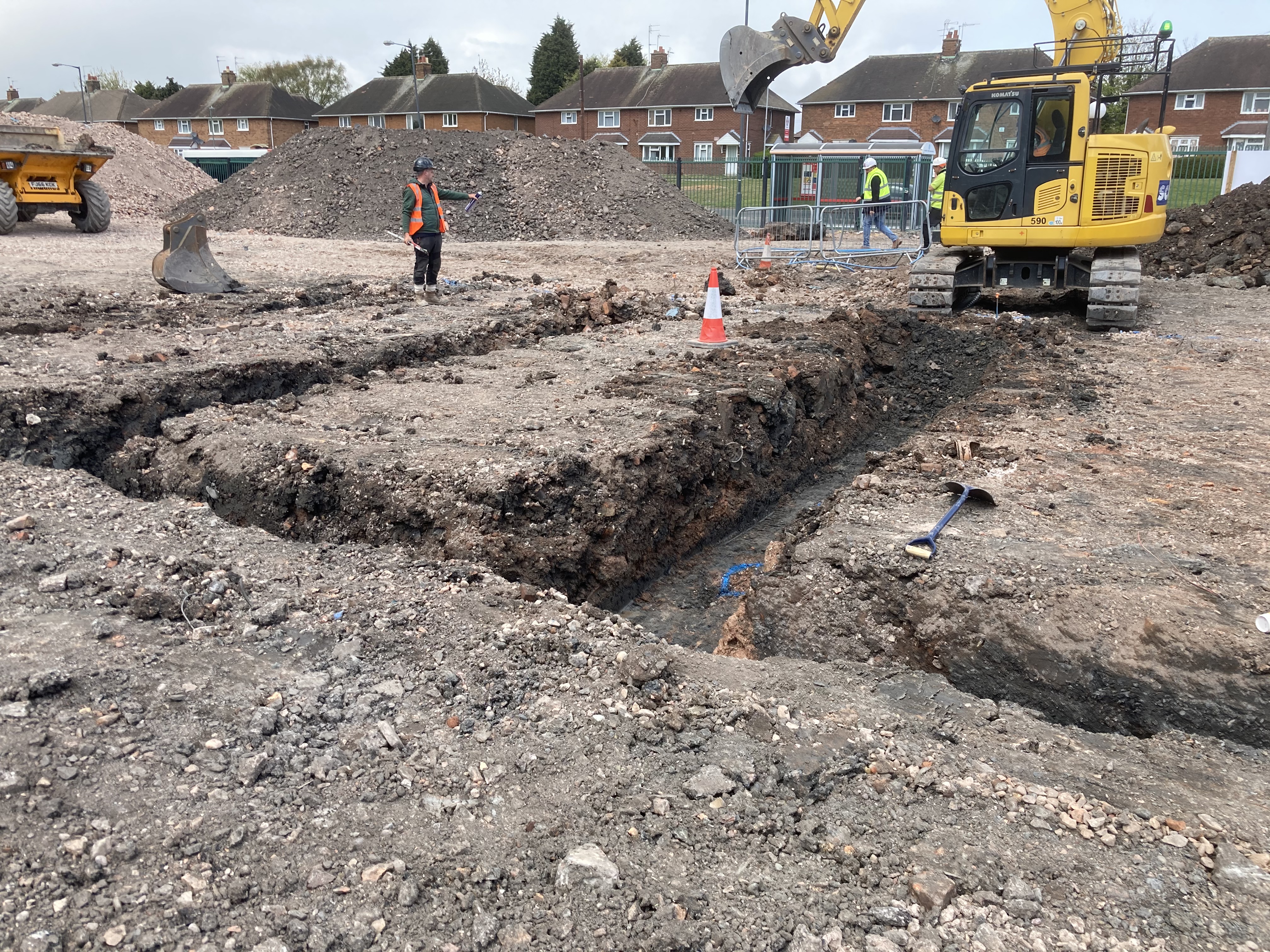 Machinery and people working on a building site