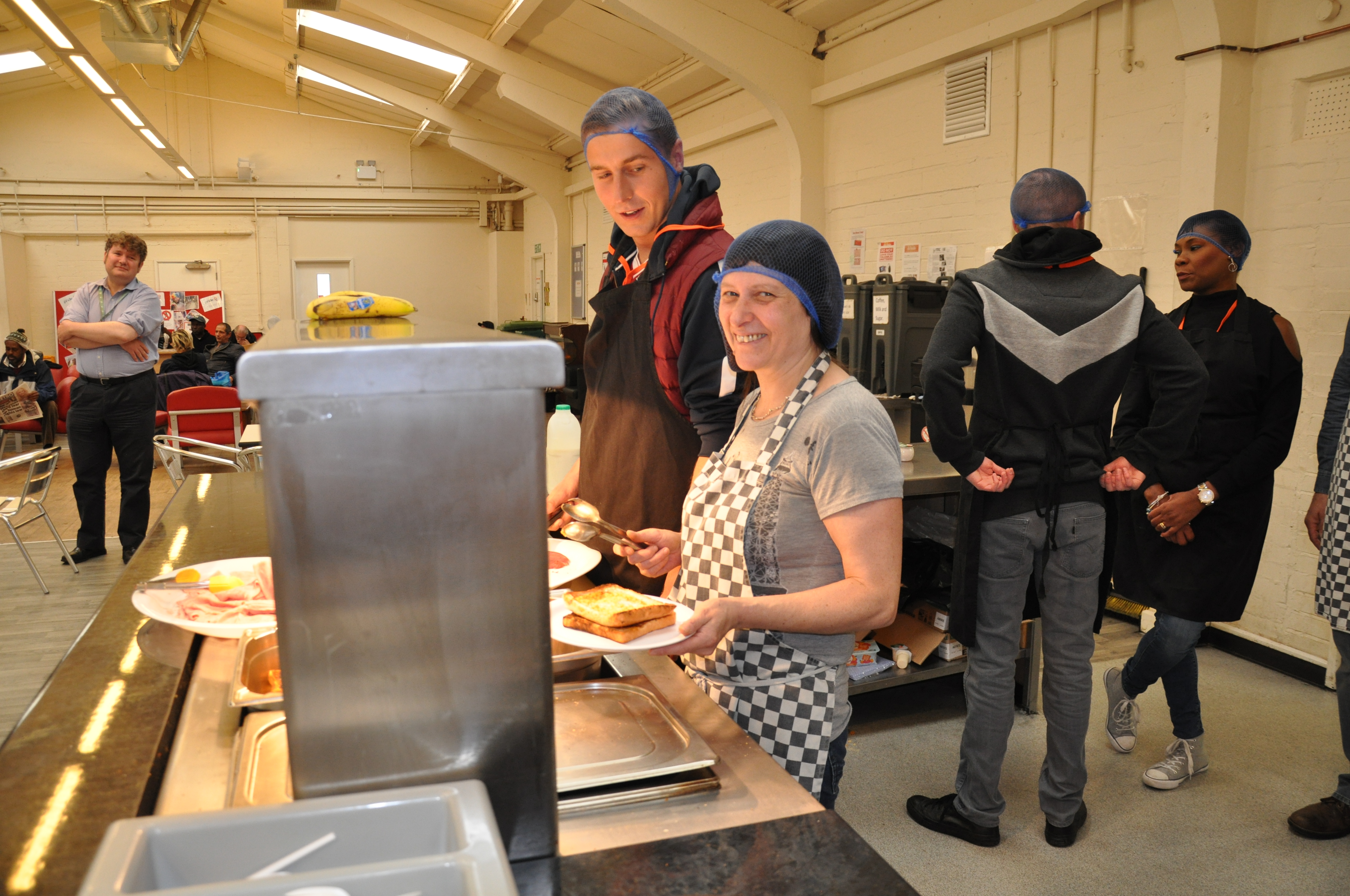 Maria Urmos volunteering at a soup kitchen