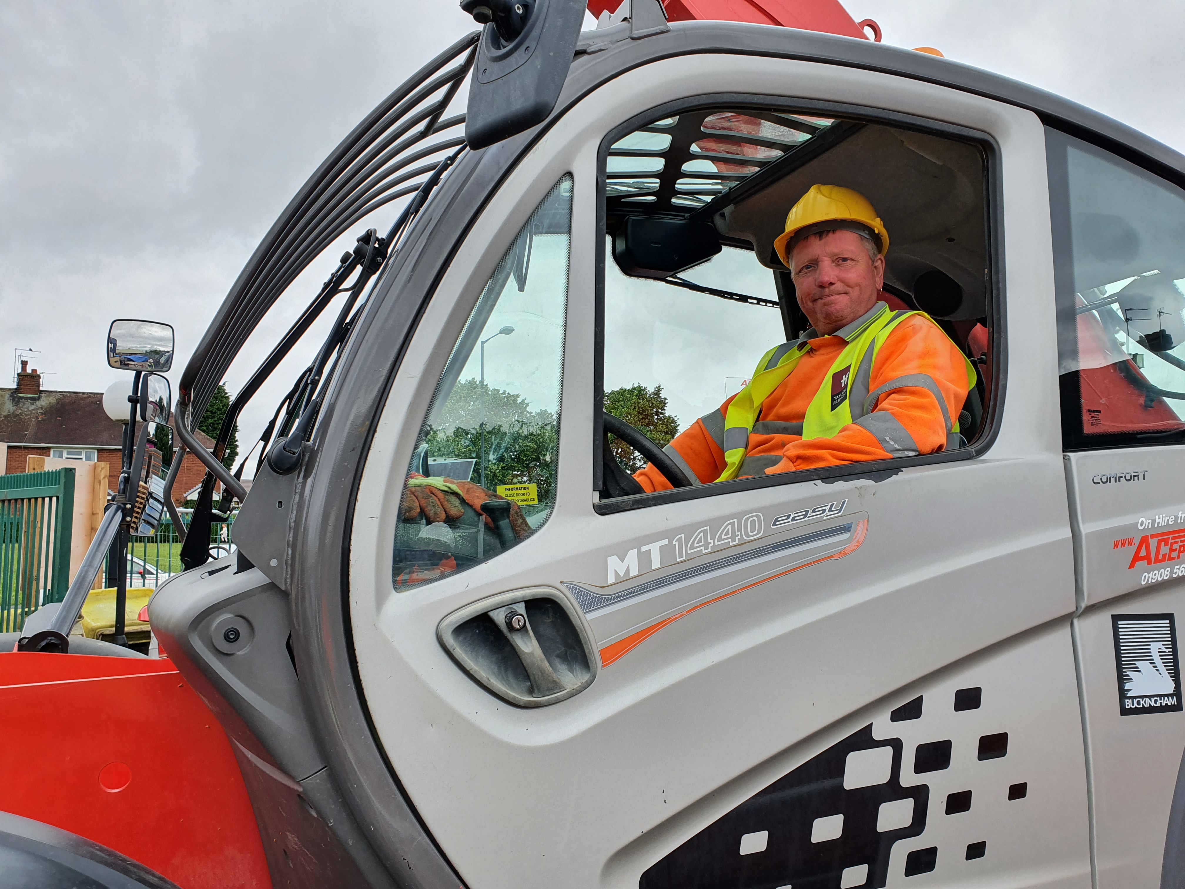 Rob Arrowsmith driving a forklift