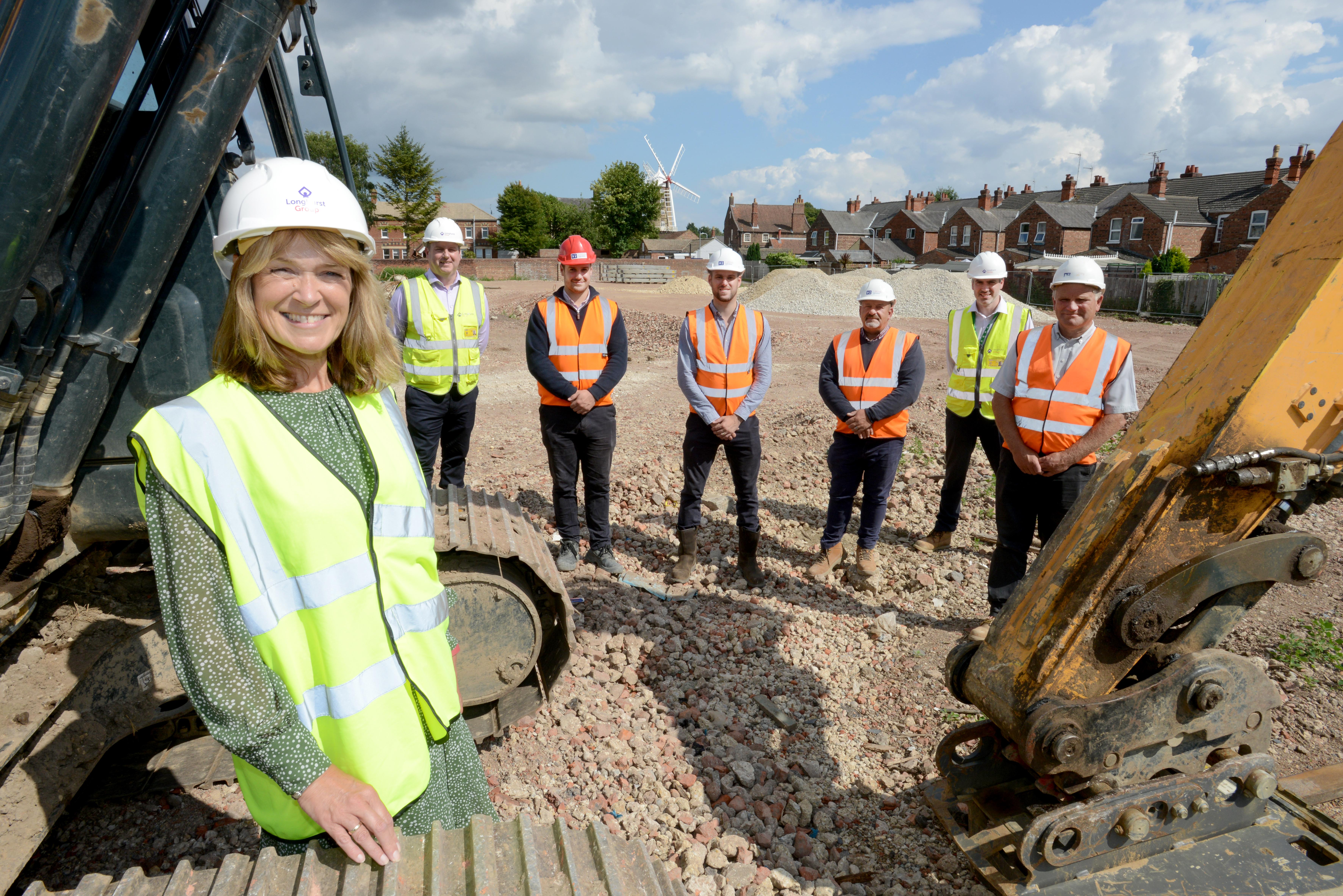 Picture showing colleagues from Longhurst Group and D Brown Builders at the site of our Caxton Place development