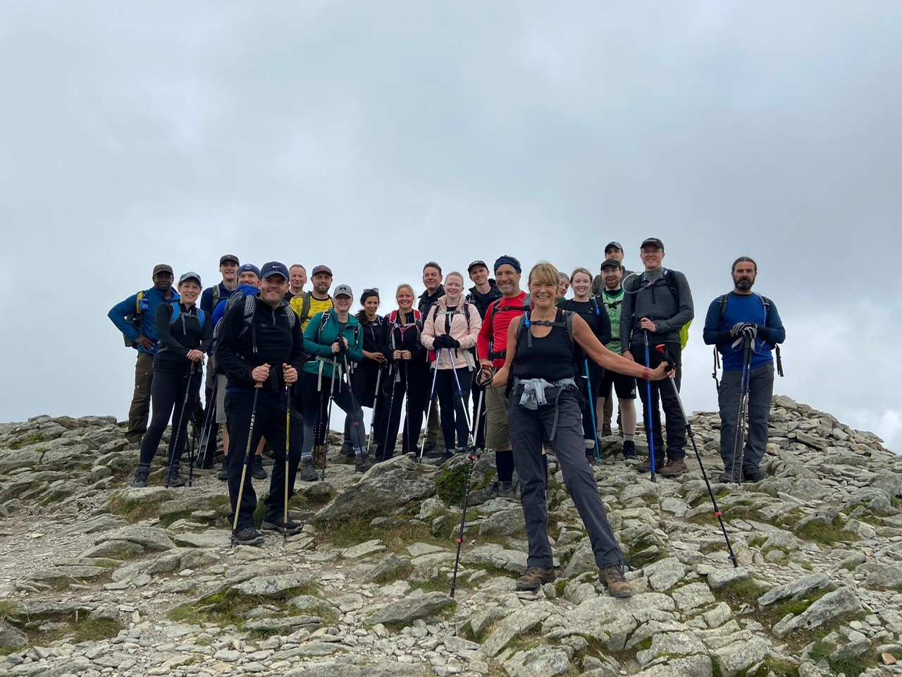 Group of people on the top of a mountain