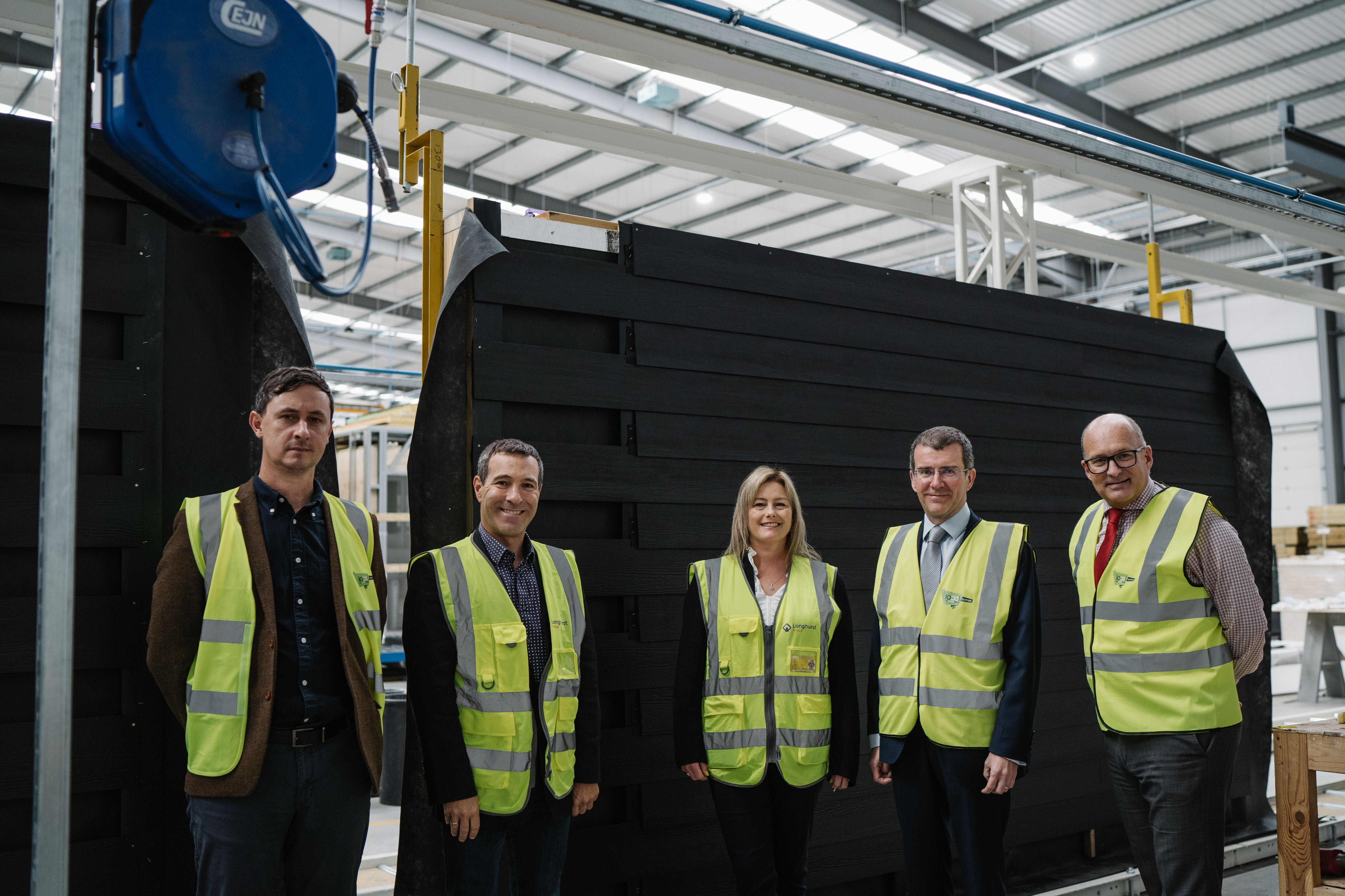 Group of colleagues at LoCal homes factory