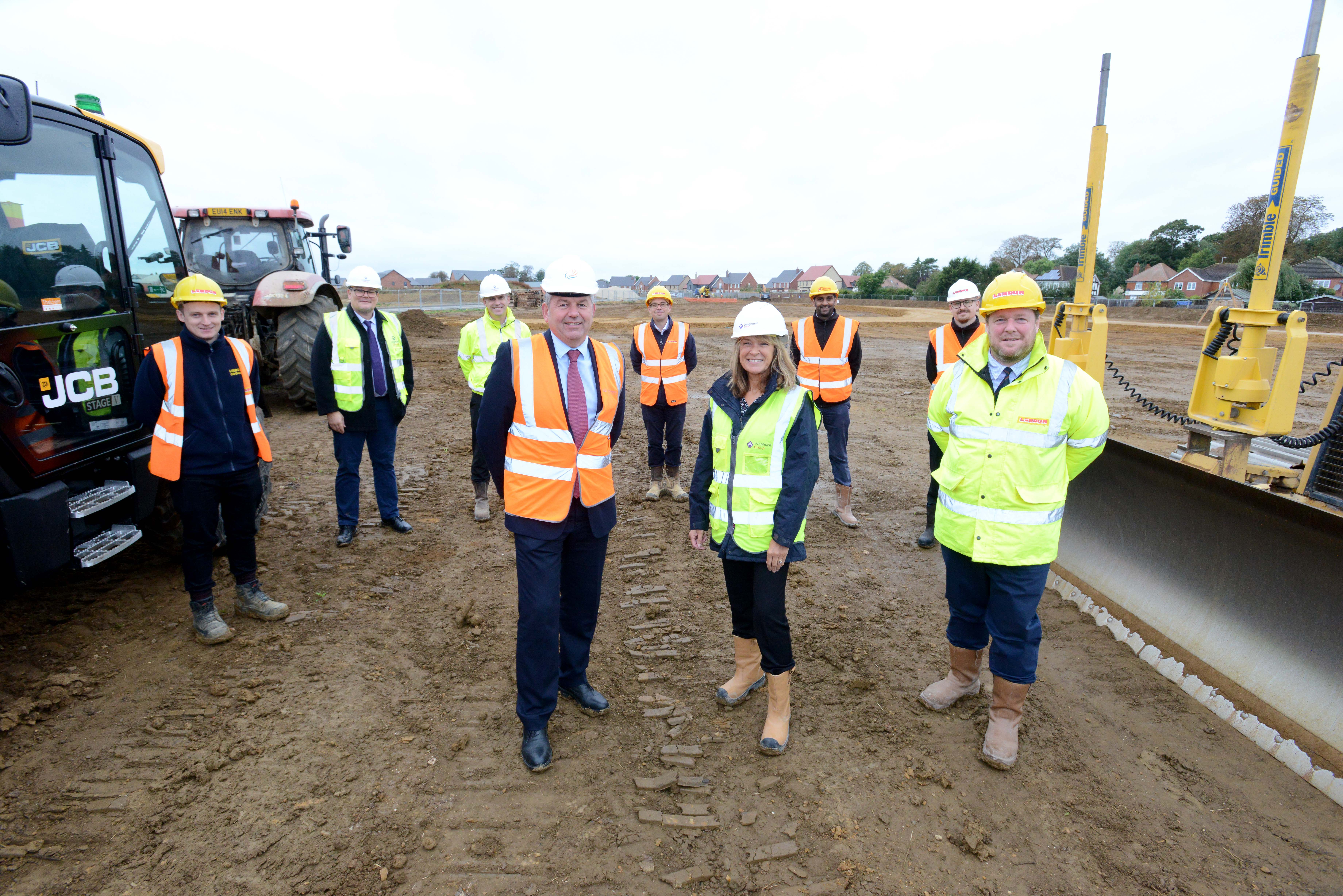 Group of people at Handley Chase, wearing high-vis clothing