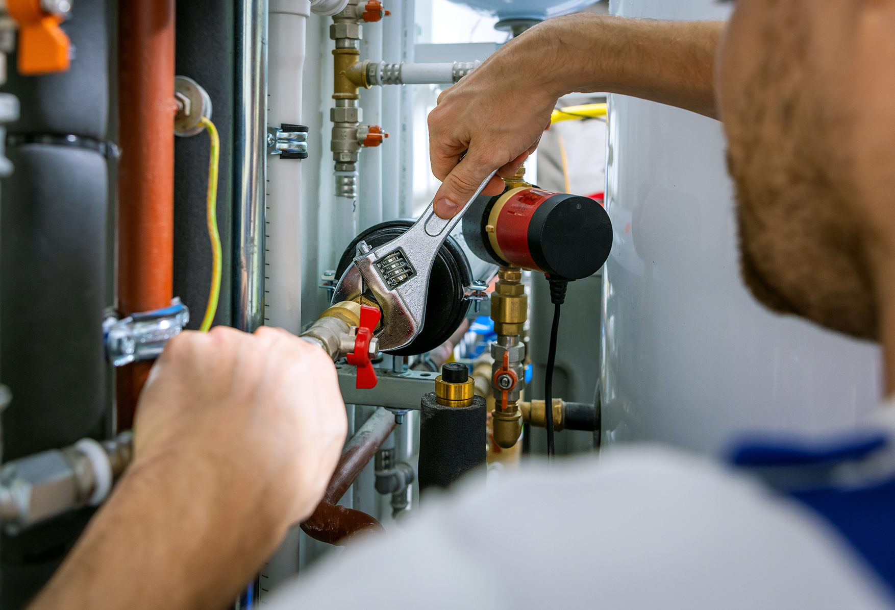 Contractor conducting plumbing repairs