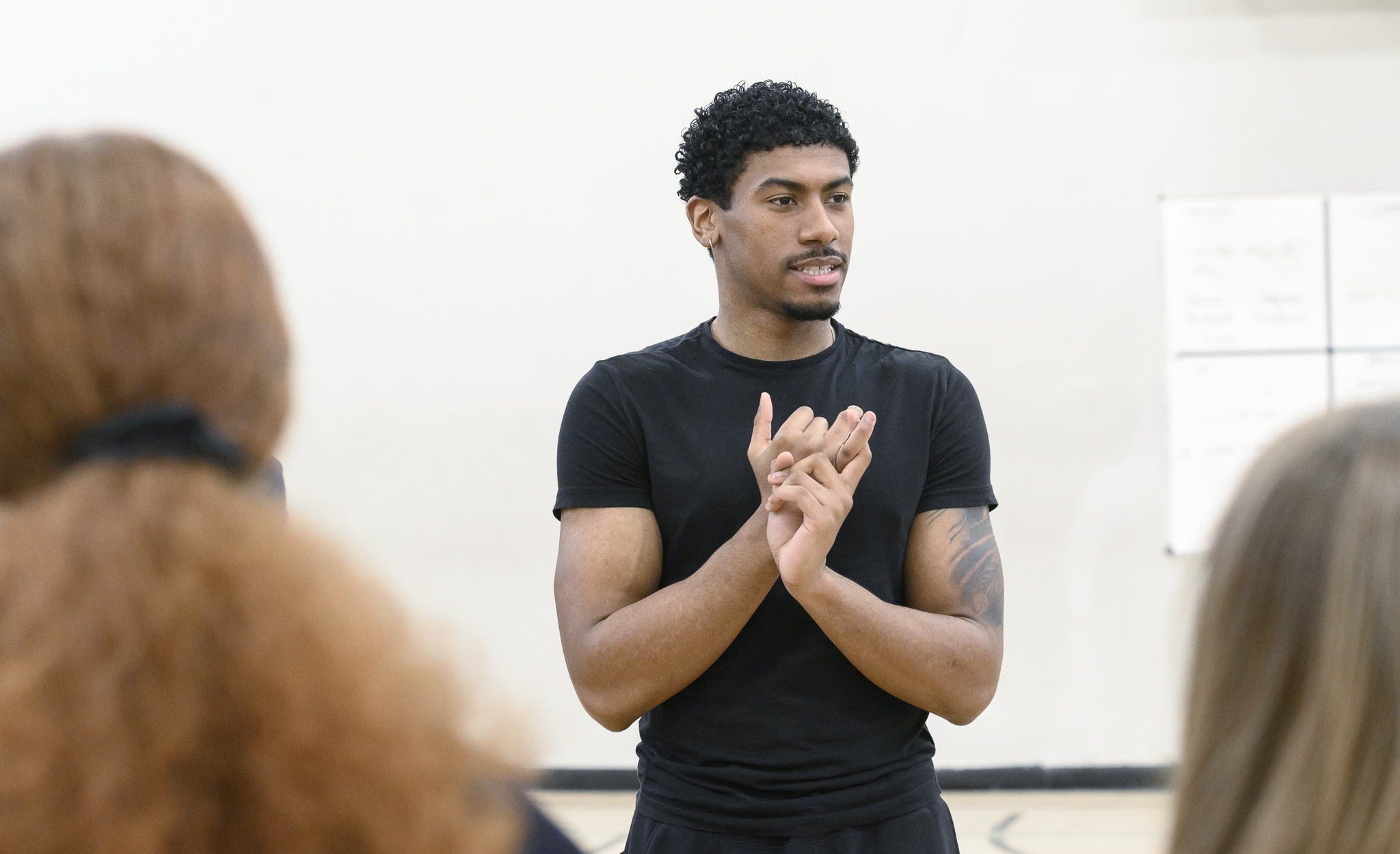 Man talking to a group of people