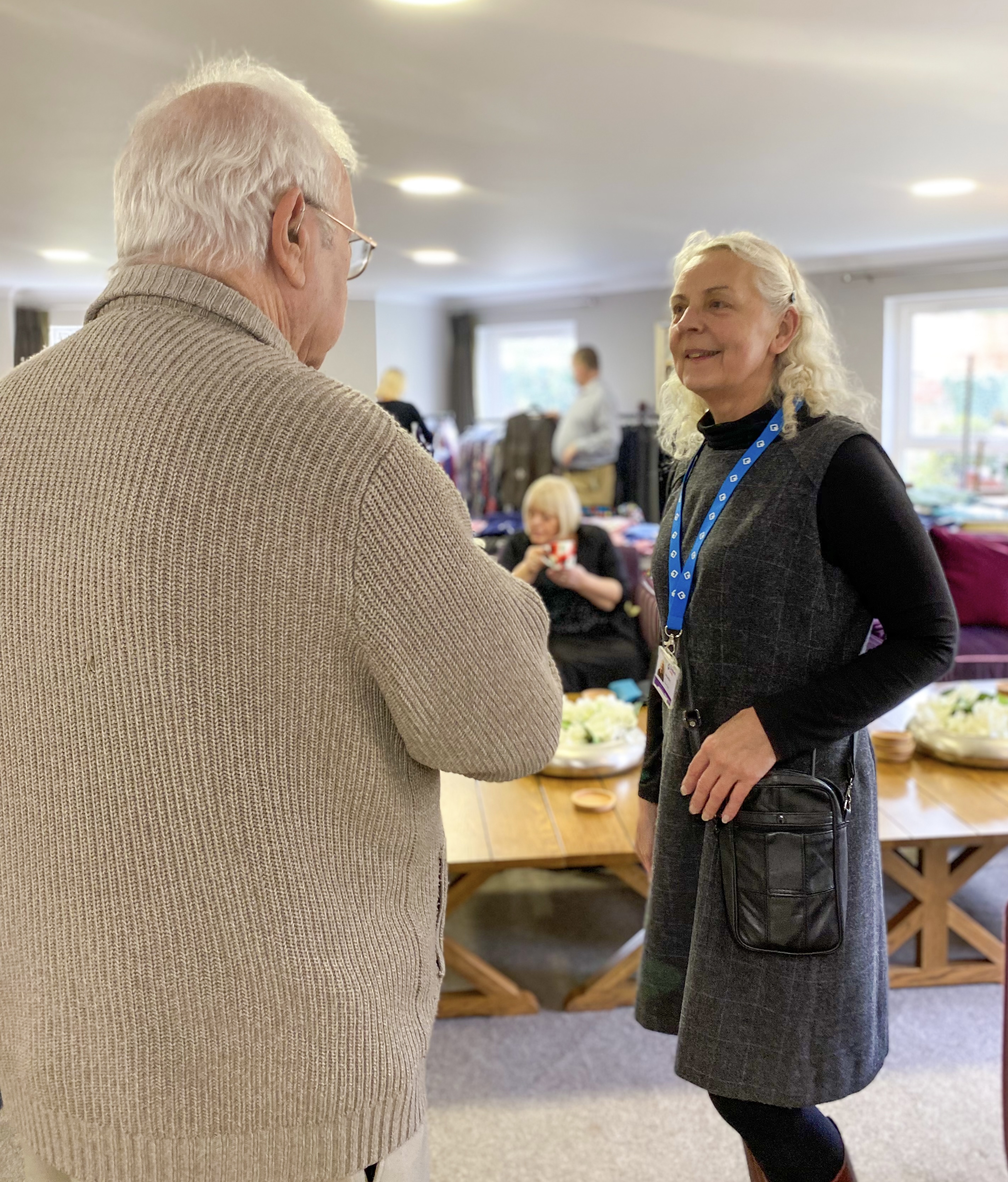 Beverley has a friendly chat with a male resident