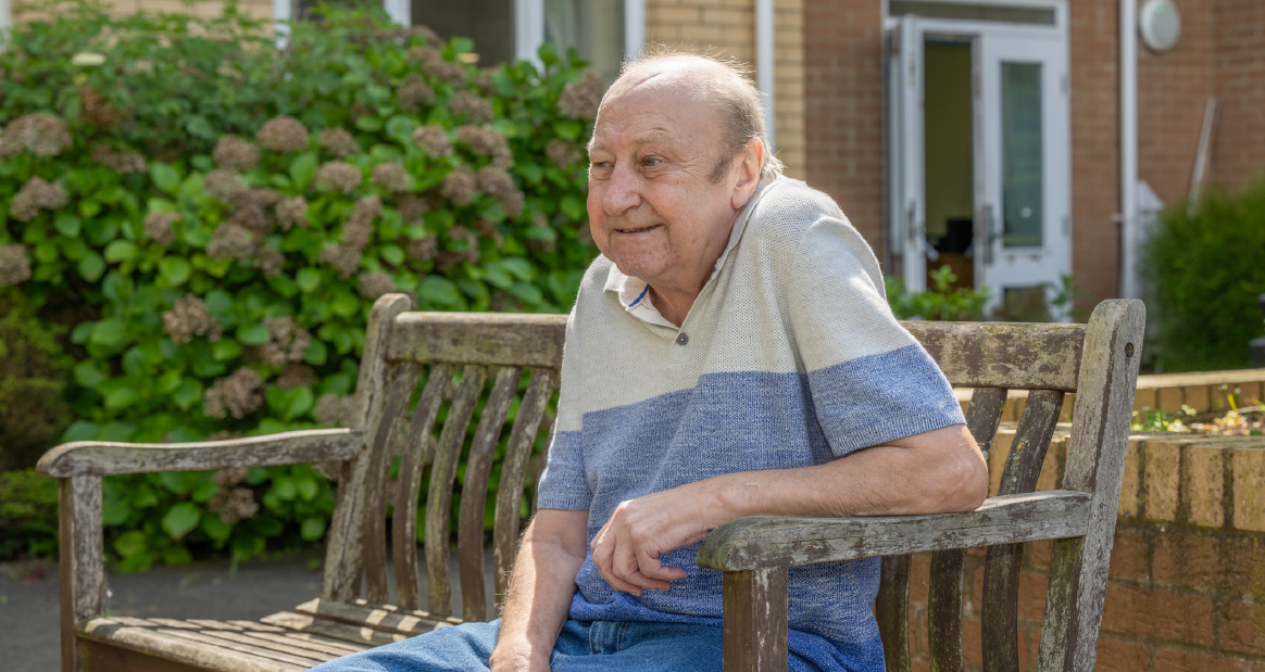 Man sat on a bench